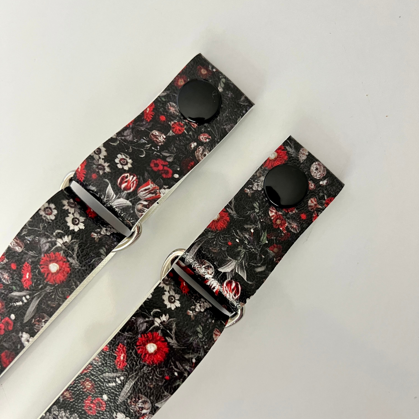 Vampire Floral Strap - Vegan Leather: Add a touch of gothic romance to your apron ensemble with our Vampire Floral Strap, made from high-quality vegan leather. This unique design combines floral motifs with dark, mysterious elements, making it a striking choice for those who appreciate a touch of drama.